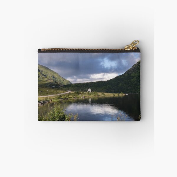 Item preview, Wonderful landscapes in Norway. Nordland. Beautiful scenery of a white house in a valley on the Lofoten Islands. Summer sunny day designed and sold by Maurizio Fabbroni.
