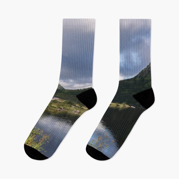 Item preview, Wonderful landscapes in Norway. Nordland. Beautiful scenery of a white house in a valley on the Lofoten Islands. Summer sunny day designed and sold by Maurizio Fabbroni.