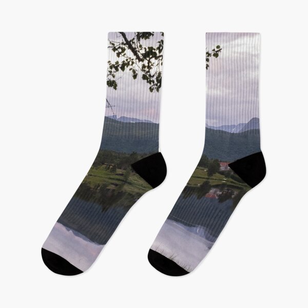 Item preview, Wonderful landscapes in Norway. Nordland. Beautiful scenery of a valley with houses on the hill. Mirror in the lake. Calm water in a cloudy summer day. Snowed mountains in background. designed and sold by Maurizio Fabbroni.