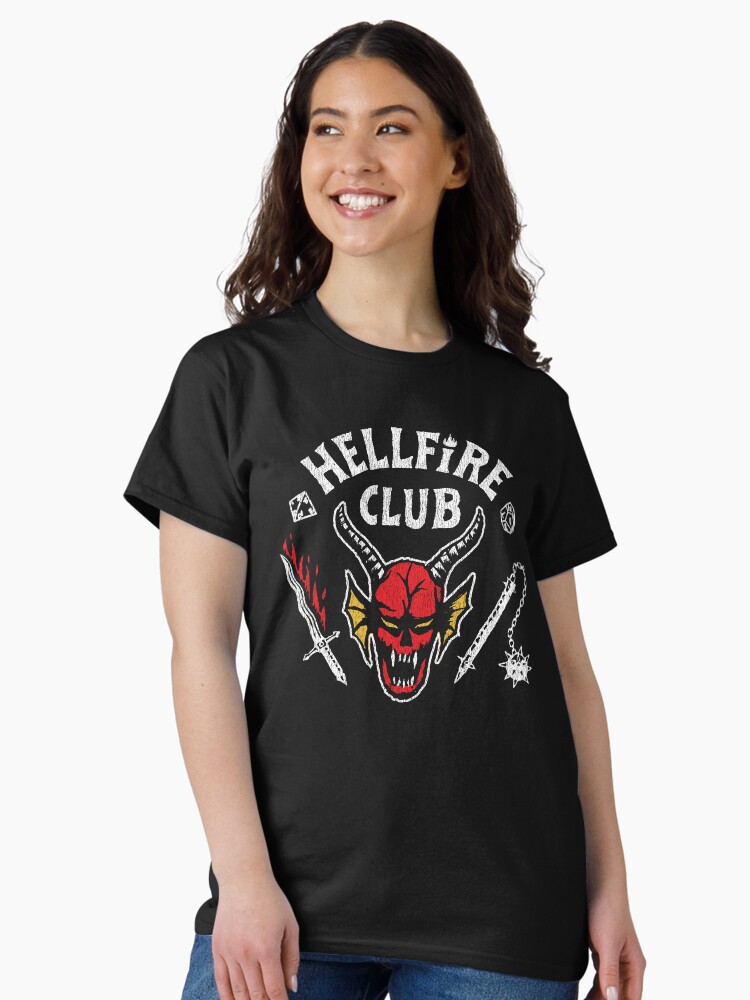 Thumbnail 1 of 7, Classic T-Shirt, Stranger Things 4 Hellfire Club Skull & Weapons designed and sold by FifthSun.