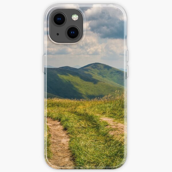dirt road through grassy meadow on the ridge iPhone Soft Case