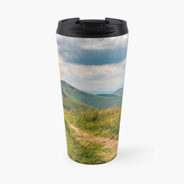 dirt road through grassy meadow on the ridge Travel Mug