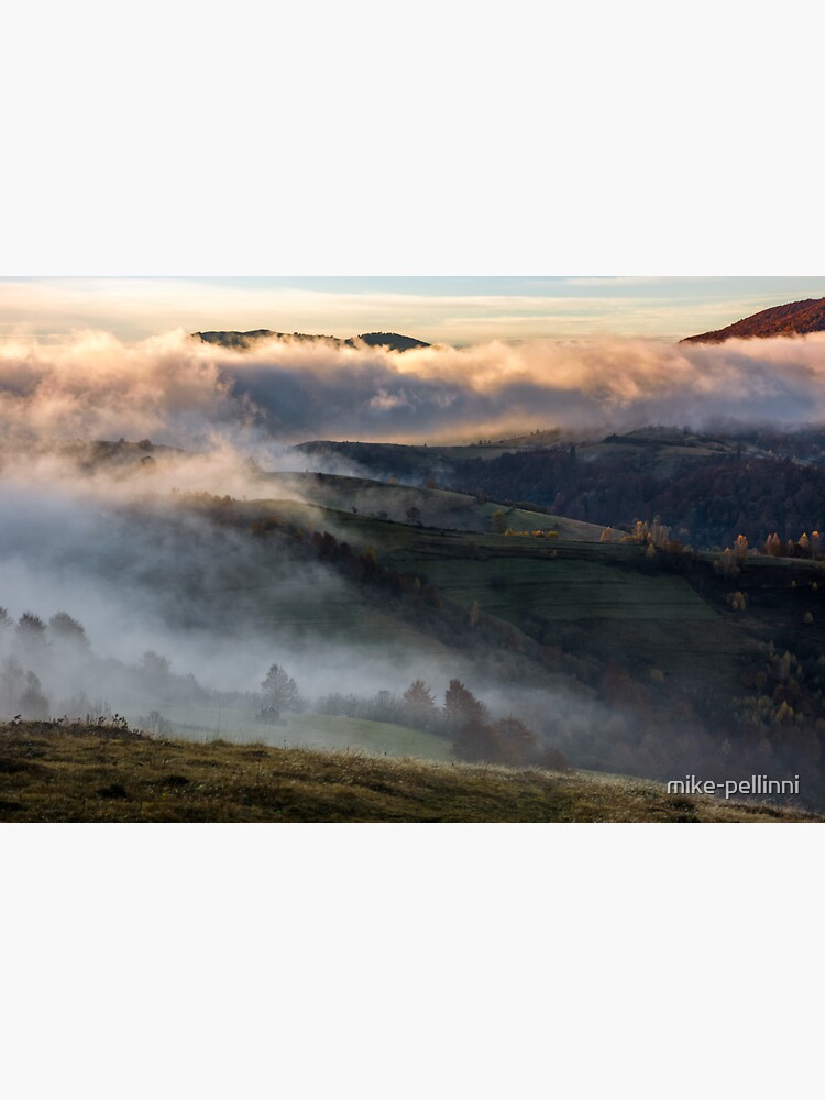 Thumbnail 3 of 3, Sticker, thick fog on hills in countryside at sunrise designed and sold by mike-pellinni.