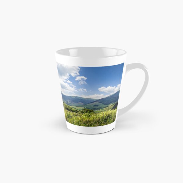 meadow with flowers in mountains Tall Mug