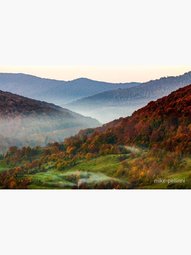 cold fog on hot sunrise in mountains by mike-pellinni