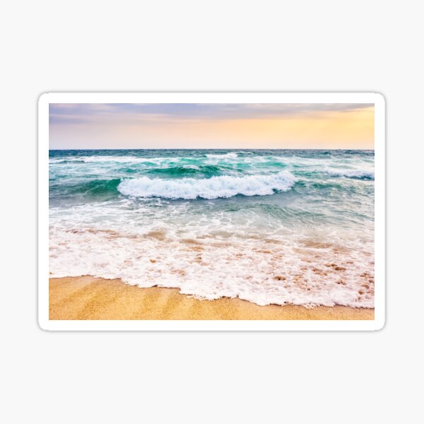 sea waves crashing on sandy beach Sticker