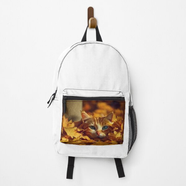 Item preview, Orange tabby cat peeking out of a pile of raked autumn leaves designed and sold by pnywest.