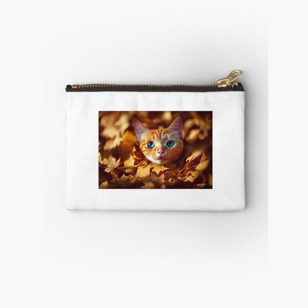 Item preview, Orange tabby cat peeking out of a pile of raked autumn leaves designed and sold by pnywest.