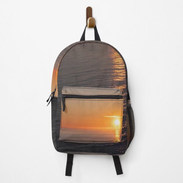 Item preview, Wonderful landscapes in Norway. Nord-Norge. Beautiful scenery of a midnight sun sunset at Nordkapp (Cape North). Boat and globe on a cliff. Rippled sea and clear orange sky. (vertical) designed and sold by Maurizio Fabbroni.