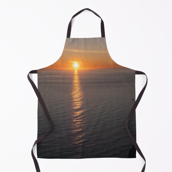 Item preview, Wonderful landscapes in Norway. Nord-Norge. Beautiful scenery of a midnight sun sunset at Nordkapp (Cape North). Boat and globe on a cliff. Rippled sea and clear orange sky. (vertical) designed and sold by Maurizio Fabbroni.