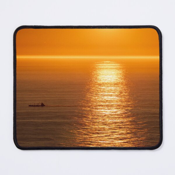 Item preview, Wonderful landscapes in Norway. Nord-Norge. Beautiful scenery of a midnight sun sunset at Nordkapp (Cape North). Boat and globe on a cliff. Rippled sea and clear orange sky. (vertical) designed and sold by Maurizio Fabbroni.