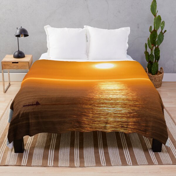 Item preview, Wonderful landscapes in Norway. Nord-Norge. Beautiful scenery of a midnight sun sunset at Nordkapp (Cape North). Boat and globe on a cliff. Rippled sea and clear orange sky. (vertical) designed and sold by Maurizio Fabbroni.