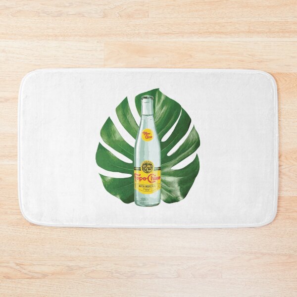 Item preview, TopoChico Bottle in front a Plant leaf designed and sold by Vela Barrera.
