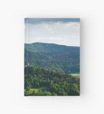 Afternoon light over church Hardcover Journal