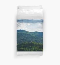 Afternoon light over church Duvet Cover