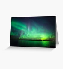 Northern lights over lake Greeting Card