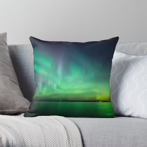 Northern lights over lake Throw Pillow
