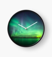 Northern lights over lake Clock