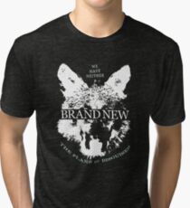 we have neither the plans nor disguises Tri-blend T-Shirt