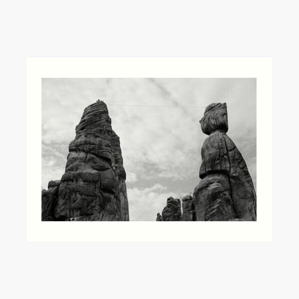 Climbing the rocks Art Print