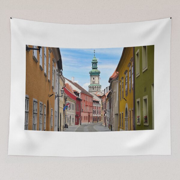 Item preview, Street with old buildings and Firewatch tower in Sopron Hungary designed and sold by goceris.