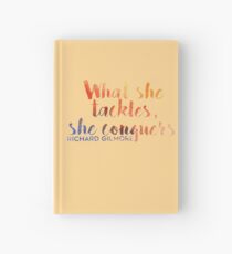 What She Tackles, She Conquers Hardcover Journal