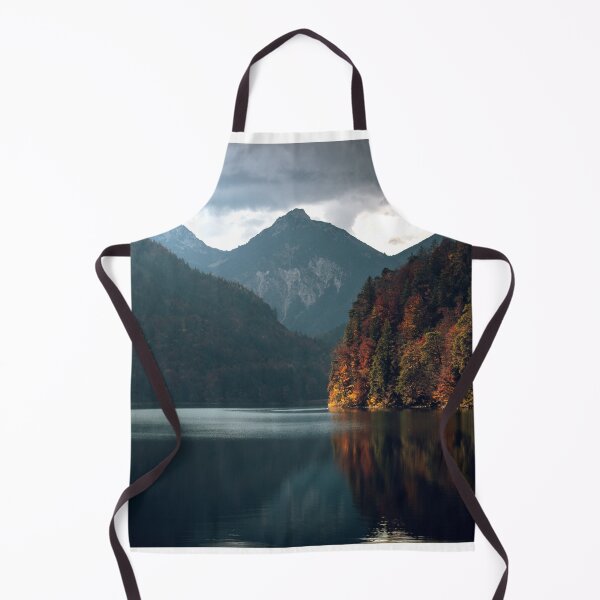Item preview, Alpsee Lake with Mountain backdrop and orange autumnal forests - Bavarian Alps, Germany designed and sold by BackpackTravel.