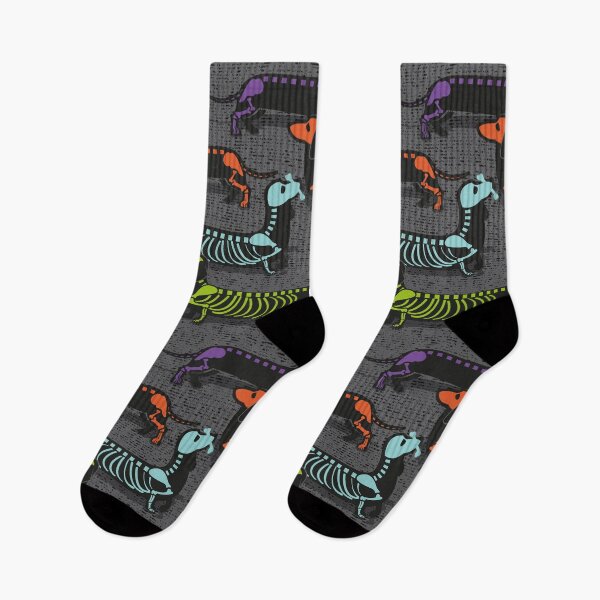 Item preview, Spooktacular long dachshunds skeleton // dark grey background multicoloured halloween dog bones designed and sold by SelmaCardoso.