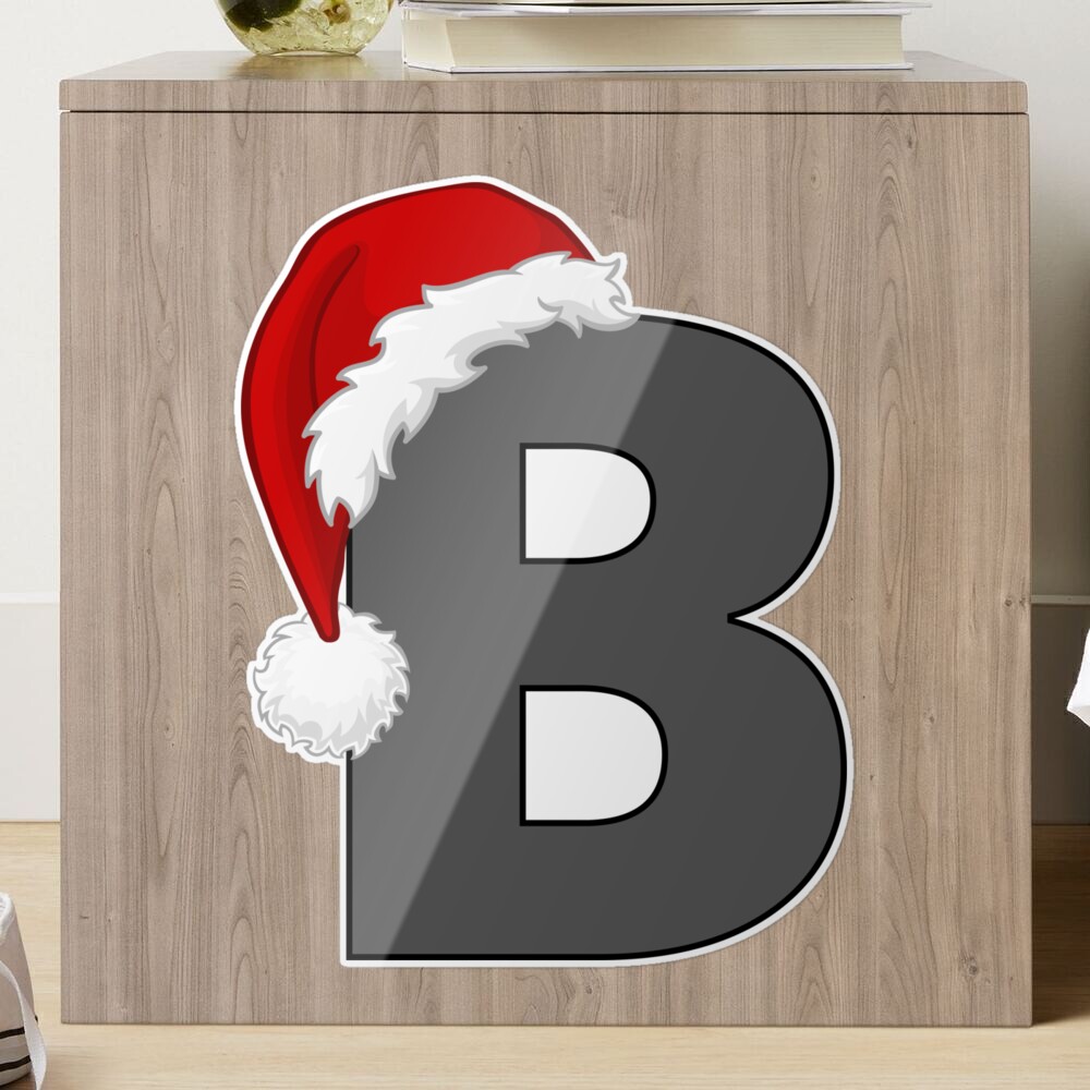 Christmas letter B with Santa Claus cap. One part of great christmas  alphabet. Stock Photo by ©vladvitek 33361153