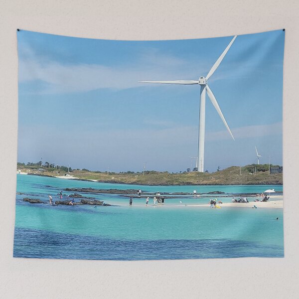 Item preview, Jeju Gimnyeong Sea boasts a harmonious appearance with a windmill in the beautiful emerald-colored sea in the blue sky. designed and sold by human8891.