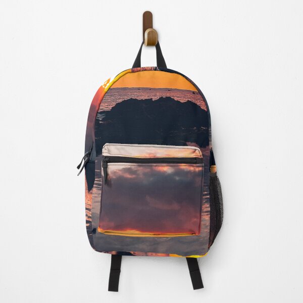 Item preview, orange sunset with heavy clouds over beach designed and sold by Durgaa D.