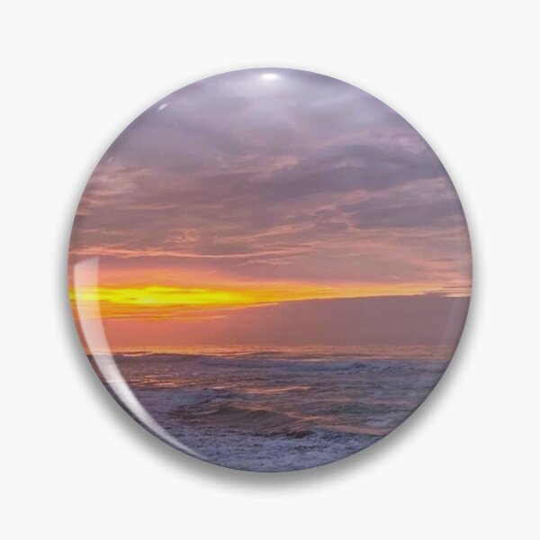 Item preview, orange, purple and grey sunset with heavy clouds over clam beach designed and sold by Durgaa D.