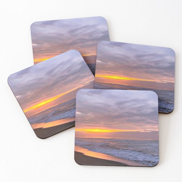 Item preview, orange, purple and grey sunset with heavy clouds over clam beach designed and sold by Durgaa D.