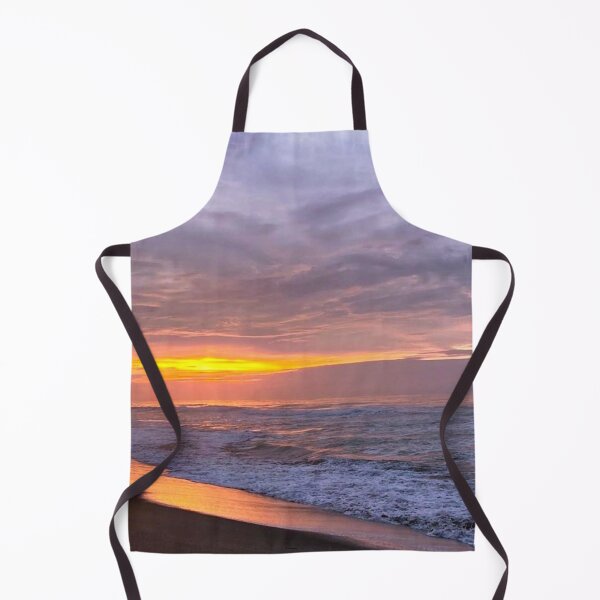 Item preview, orange, purple and grey sunset with heavy clouds over clam beach designed and sold by Durgaa D.