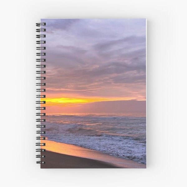 Item preview, orange, purple and grey sunset with heavy clouds over clam beach designed and sold by Durgaa D.