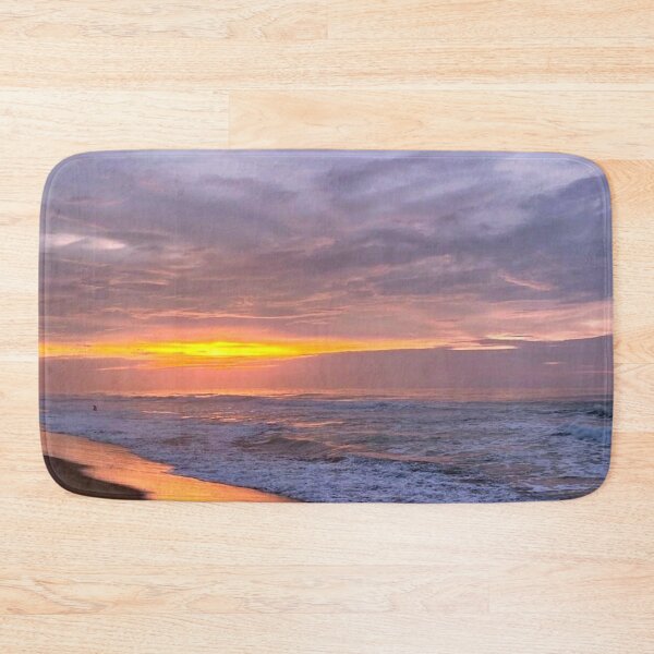 Item preview, orange, purple and grey sunset with heavy clouds over clam beach designed and sold by Durgaa D.