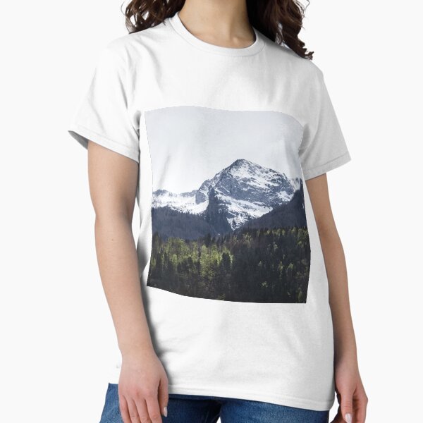 Winter and Spring - green trees and snowy mountains Classic T-Shirt