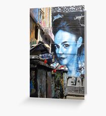 Blue girl in a sea of rubbish Greeting Card