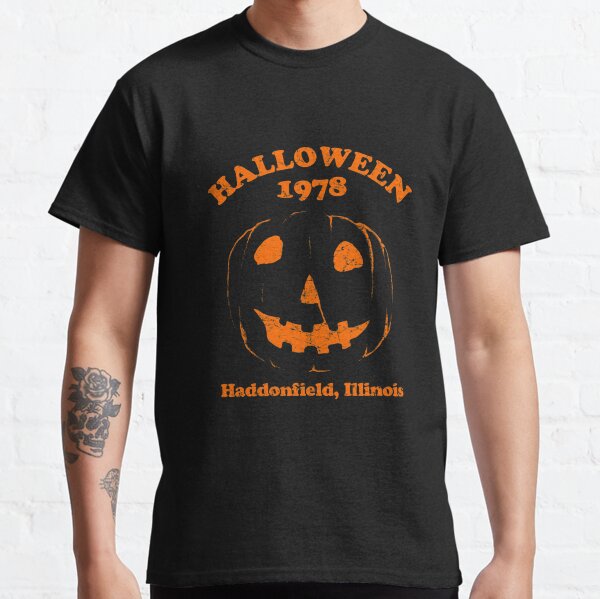 Item preview, Halloween 1978 Holiday Spooky Myers Pumpkin Haddonfield Classic T-Shirt designed and sold by NorlynPotts.