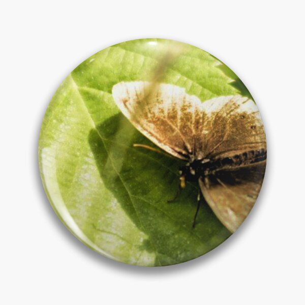 Item preview, brown butterfly on a green leaf designed and sold by Francespoppy.