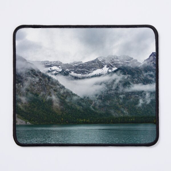 Item preview, Snowy mountains in the fog at Plansee lake designed and sold by MarionsArt.