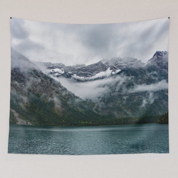 Item preview, Snowy mountains in the fog at Plansee lake designed and sold by MarionsArt.