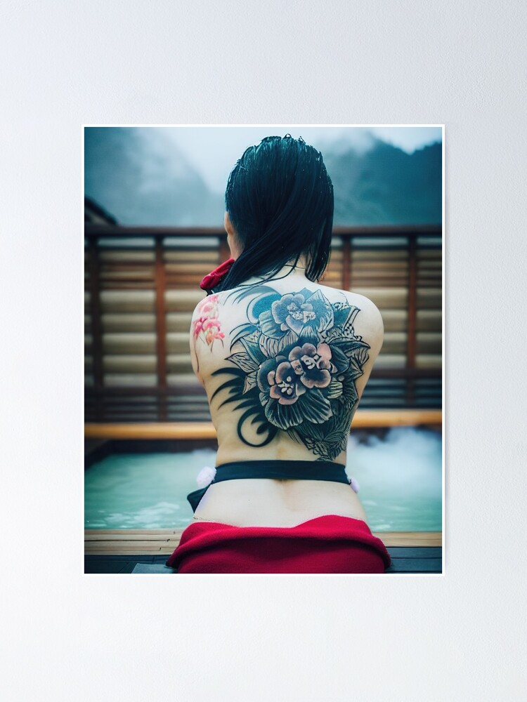 Yakuza girl showing her back tattoo\
