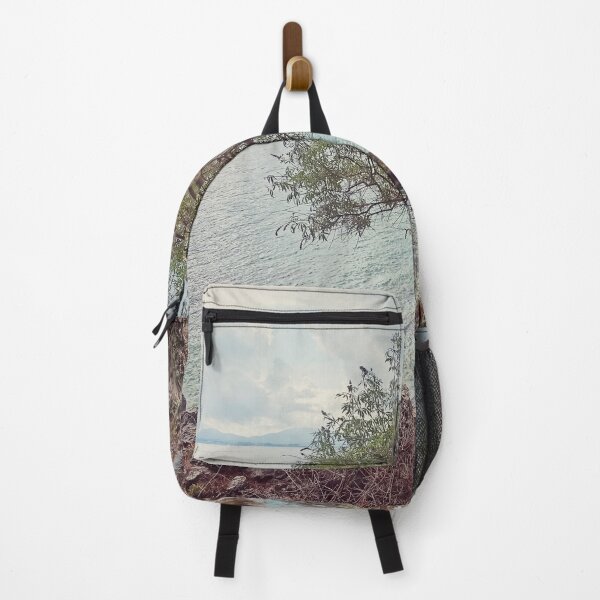 Item preview, SINGLE OLIVE TREE OVERHANGS THE SEA GREECE designed and sold by nickbrayimages.