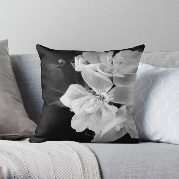 Beautiful black and white geranium flower close-up Throw Pillow