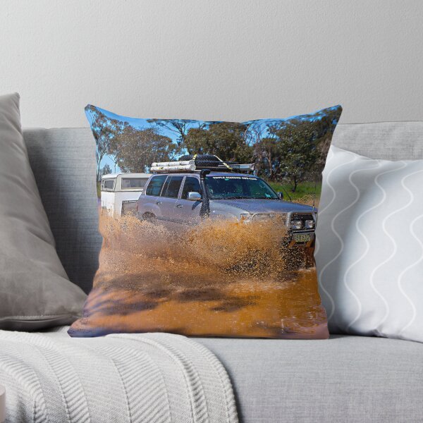 Landcruiser and Camper through water crossing Throw Pillow