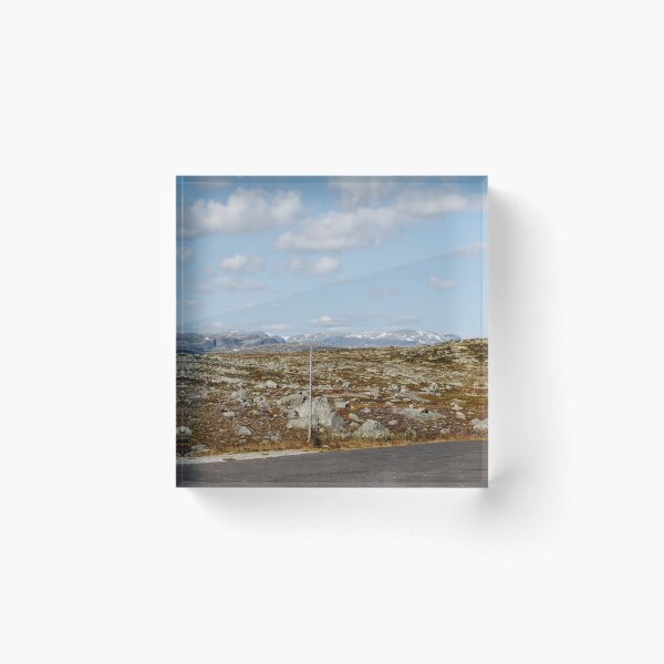 Item preview, Road through the stone tundra with landmarks against a background of snow-capped mountains and a cloudy sky designed and sold by EG Creativity Art.