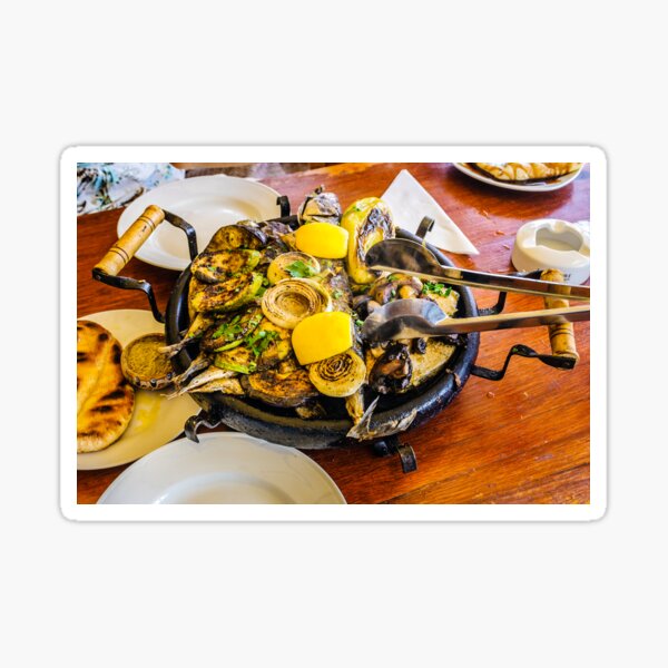Bulgarian hot plate with fish, courgettes and onions Sticker