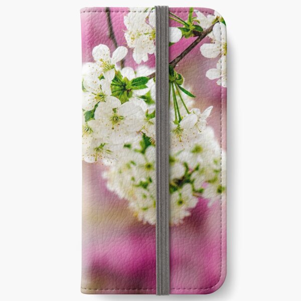 flowers of apple tree on a bulr background iPhone Wallet