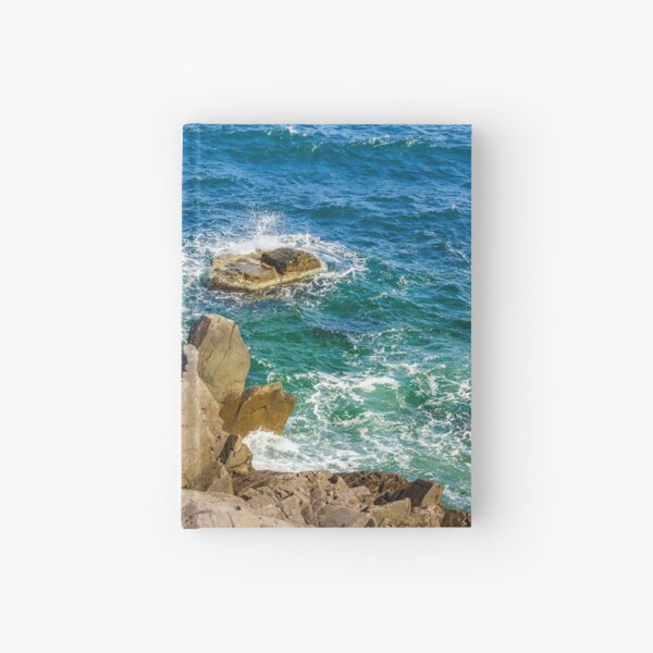 sea wave breaks about rocky shore Hardcover Journal